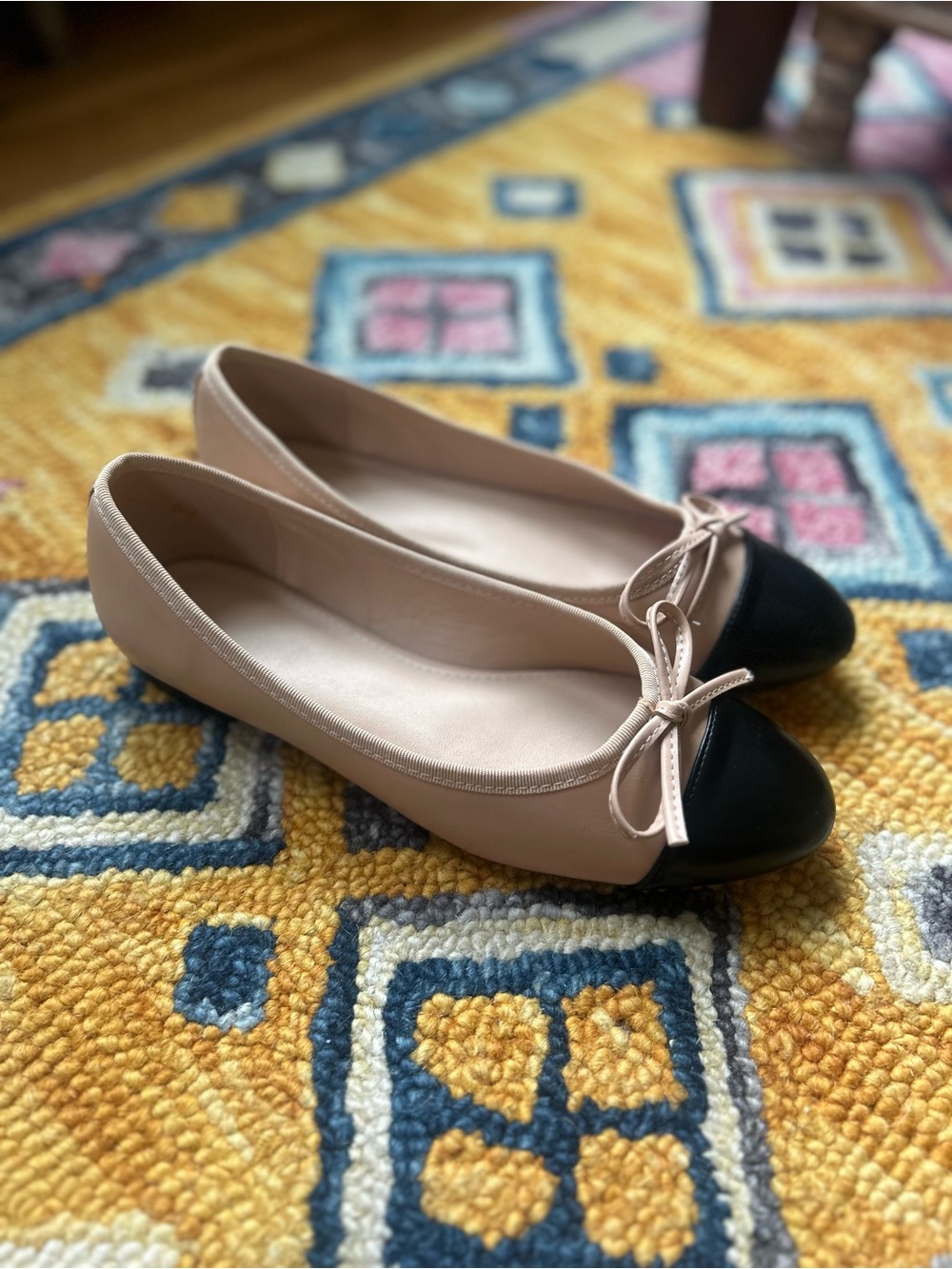 Two-Tone Beige and Black Ballet Flats with Bow